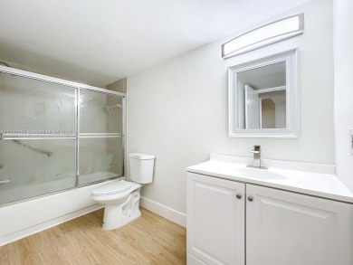 This unit is a RENOVATED & UPDATED -1370 SF 2BR/2BA unit in the on Sunrise Lakes Phase IV Golf Course in Florida - for sale on GolfHomes.com, golf home, golf lot