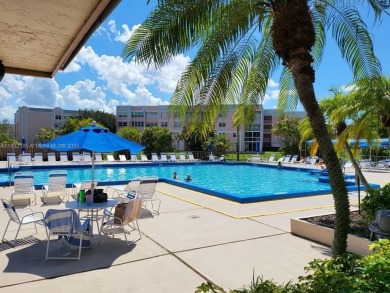 This unit is a RENOVATED & UPDATED -1370 SF 2BR/2BA unit in the on Sunrise Lakes Phase IV Golf Course in Florida - for sale on GolfHomes.com, golf home, golf lot