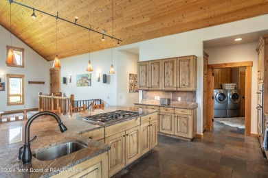 The setting of this Victor estate is magical!   At the end of a on Teton Springs Resort and Club in Idaho - for sale on GolfHomes.com, golf home, golf lot