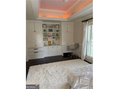 Nestled on over half an acre in the coveted Atlanta Country Club on Atlanta Country Club in Georgia - for sale on GolfHomes.com, golf home, golf lot