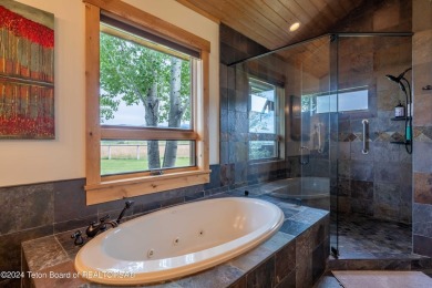 The setting of this Victor estate is magical!   At the end of a on Teton Springs Resort and Club in Idaho - for sale on GolfHomes.com, golf home, golf lot