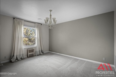 Experience refined elegance in this over 5,000 sq ft on Bell Nob Golf Course in Wyoming - for sale on GolfHomes.com, golf home, golf lot