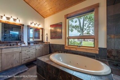 The setting of this Victor estate is magical!   At the end of a on Teton Springs Resort and Club in Idaho - for sale on GolfHomes.com, golf home, golf lot