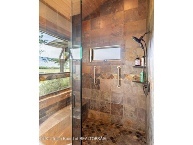 The setting of this Victor estate is magical!   At the end of a on Teton Springs Resort and Club in Idaho - for sale on GolfHomes.com, golf home, golf lot
