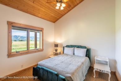 The setting of this Victor estate is magical!   At the end of a on Teton Springs Resort and Club in Idaho - for sale on GolfHomes.com, golf home, golf lot