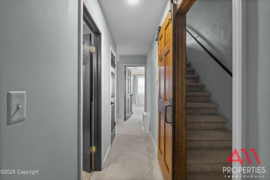 Experience refined elegance in this over 5,000 sq ft on Bell Nob Golf Course in Wyoming - for sale on GolfHomes.com, golf home, golf lot