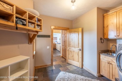 The setting of this Victor estate is magical!   At the end of a on Teton Springs Resort and Club in Idaho - for sale on GolfHomes.com, golf home, golf lot