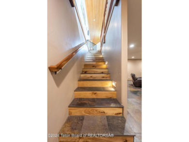 The setting of this Victor estate is magical!   At the end of a on Teton Springs Resort and Club in Idaho - for sale on GolfHomes.com, golf home, golf lot