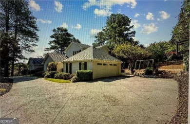 Nestled on over half an acre in the coveted Atlanta Country Club on Atlanta Country Club in Georgia - for sale on GolfHomes.com, golf home, golf lot