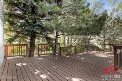 Experience refined elegance in this over 5,000 sq ft on Bell Nob Golf Course in Wyoming - for sale on GolfHomes.com, golf home, golf lot