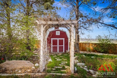 Experience refined elegance in this over 5,000 sq ft on Bell Nob Golf Course in Wyoming - for sale on GolfHomes.com, golf home, golf lot