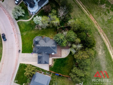 Experience refined elegance in this over 5,000 sq ft on Bell Nob Golf Course in Wyoming - for sale on GolfHomes.com, golf home, golf lot