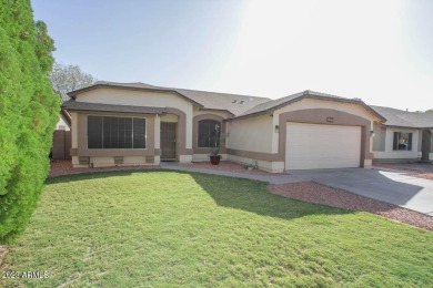 This 4 bedroom home with family and living room, vaulted on Adobe Dam Family Golf Center in Arizona - for sale on GolfHomes.com, golf home, golf lot