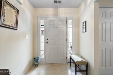 Welcome to this charming and well-appointed single-story home on Crow Creek Golf Club in North Carolina - for sale on GolfHomes.com, golf home, golf lot