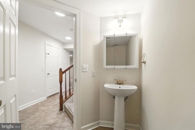Located on one of the neighborhood's most coveted lots, this on Virginia Oaks Golf Club in Virginia - for sale on GolfHomes.com, golf home, golf lot