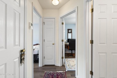 Welcome to this charming and well-appointed single-story home on Crow Creek Golf Club in North Carolina - for sale on GolfHomes.com, golf home, golf lot