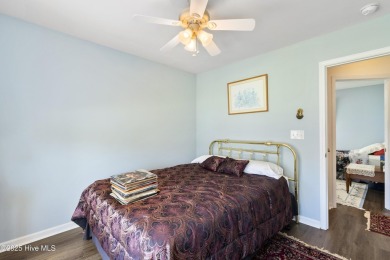 Welcome to this charming and well-appointed single-story home on Crow Creek Golf Club in North Carolina - for sale on GolfHomes.com, golf home, golf lot