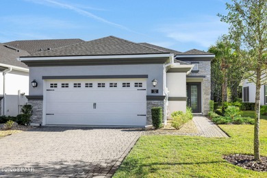This beautiful Arbor II Model Townhome built in 2022 is located on Plantation Bay Golf and Country Club in Florida - for sale on GolfHomes.com, golf home, golf lot