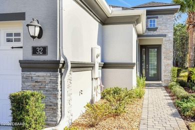 This beautiful Arbor II Model Townhome built in 2022 is located on Plantation Bay Golf and Country Club in Florida - for sale on GolfHomes.com, golf home, golf lot