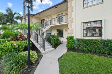 Beautiful and spacious first-floor 2 bedroom, 2 bath condo on The Golf Club of Jupiter in Florida - for sale on GolfHomes.com, golf home, golf lot