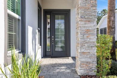 This beautiful Arbor II Model Townhome built in 2022 is located on Plantation Bay Golf and Country Club in Florida - for sale on GolfHomes.com, golf home, golf lot