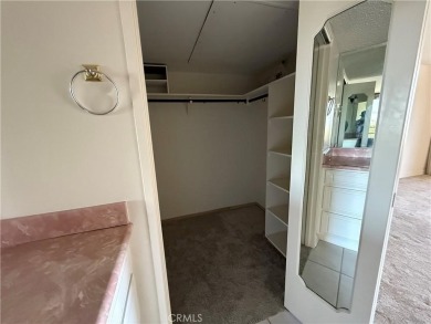 This is a popular east-facing C Unit in the Towers on the 10th on Leisure Village Par 3 Golf Course in California - for sale on GolfHomes.com, golf home, golf lot