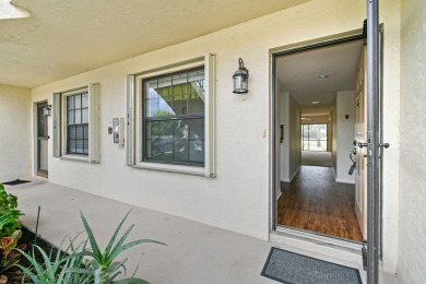 Beautiful and spacious first-floor 2 bedroom, 2 bath condo on The Golf Club of Jupiter in Florida - for sale on GolfHomes.com, golf home, golf lot