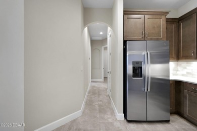 This beautiful Arbor II Model Townhome built in 2022 is located on Plantation Bay Golf and Country Club in Florida - for sale on GolfHomes.com, golf home, golf lot