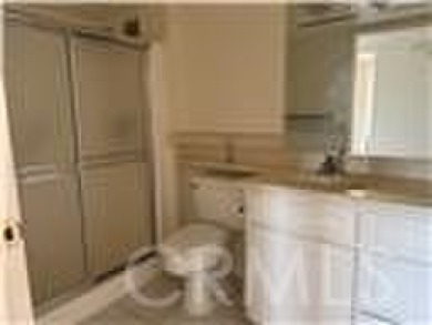 This is a popular east-facing C Unit in the Towers on the 10th on Leisure Village Par 3 Golf Course in California - for sale on GolfHomes.com, golf home, golf lot