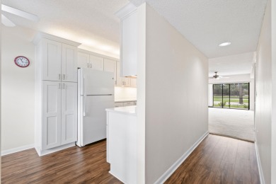 Beautiful and spacious first-floor 2 bedroom, 2 bath condo on The Golf Club of Jupiter in Florida - for sale on GolfHomes.com, golf home, golf lot