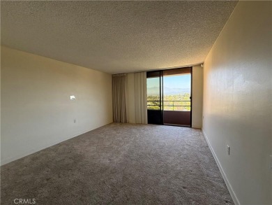 This is a popular east-facing C Unit in the Towers on the 10th on Leisure Village Par 3 Golf Course in California - for sale on GolfHomes.com, golf home, golf lot