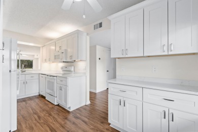 Beautiful and spacious first-floor 2 bedroom, 2 bath condo on The Golf Club of Jupiter in Florida - for sale on GolfHomes.com, golf home, golf lot