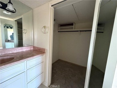 This is a popular east-facing C Unit in the Towers on the 10th on Leisure Village Par 3 Golf Course in California - for sale on GolfHomes.com, golf home, golf lot