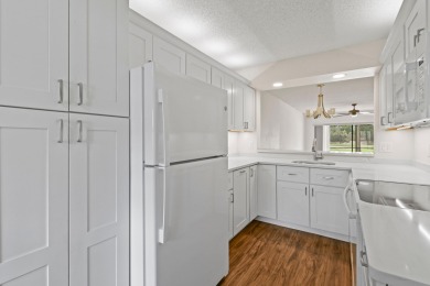 Beautiful and spacious first-floor 2 bedroom, 2 bath condo on The Golf Club of Jupiter in Florida - for sale on GolfHomes.com, golf home, golf lot