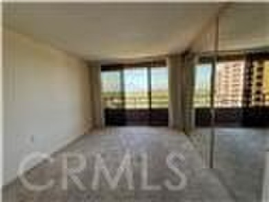 This is a popular east-facing C Unit in the Towers on the 10th on Leisure Village Par 3 Golf Course in California - for sale on GolfHomes.com, golf home, golf lot