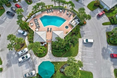 Corner unit with outstanding River & golf course views.  The on Ocean Club At the Hutchinson Island Beach Resort and Marina in Florida - for sale on GolfHomes.com, golf home, golf lot