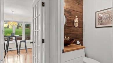 GORGEOUS + TRENDY COUNTRY CLUB HOME WITH GOLF COURSE VIEWS on Henderson Country Club in North Carolina - for sale on GolfHomes.com, golf home, golf lot