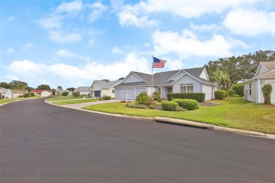 Welcome Home to this beautifully maintained Magnolia (Nueva on El Diablo Executive Golf Course in Florida - for sale on GolfHomes.com, golf home, golf lot