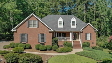 This custom, primarily one-level home features a striking on The Golf Club At Cedar Creek in South Carolina - for sale on GolfHomes.com, golf home, golf lot