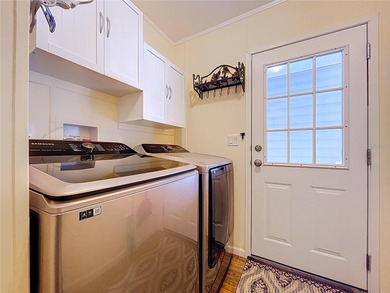 Welcome to Golf Lakes, a sought-after, resident-owned, gated 55+ on Heather Hills Golf Course in Florida - for sale on GolfHomes.com, golf home, golf lot