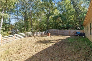 Welcome to this beautiful modern ranch-style home in the on Turtle Cove Golf Course in Georgia - for sale on GolfHomes.com, golf home, golf lot