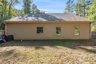 Welcome to this beautiful modern ranch-style home in the on Turtle Cove Golf Course in Georgia - for sale on GolfHomes.com, golf home, golf lot