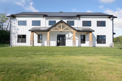 Situated on the banks of the largest lake in south central on Hillsdale Golf and Country Club in Michigan - for sale on GolfHomes.com, golf home, golf lot