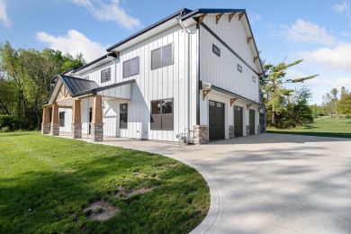 Situated on the banks of the largest lake in south central on Hillsdale Golf and Country Club in Michigan - for sale on GolfHomes.com, golf home, golf lot