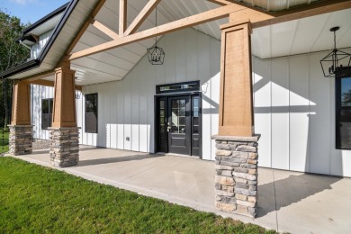 Situated on the banks of the largest lake in south central on Hillsdale Golf and Country Club in Michigan - for sale on GolfHomes.com, golf home, golf lot