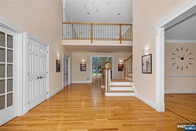 Set on a beautifully landscaped acre with a stunning circular on Old Tappan Golf Course in New Jersey - for sale on GolfHomes.com, golf home, golf lot