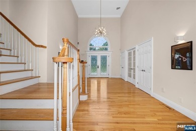 Set on a beautifully landscaped acre with a stunning circular on Old Tappan Golf Course in New Jersey - for sale on GolfHomes.com, golf home, golf lot