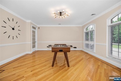 Set on a beautifully landscaped acre with a stunning circular on Old Tappan Golf Course in New Jersey - for sale on GolfHomes.com, golf home, golf lot