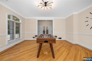 Set on a beautifully landscaped acre with a stunning circular on Old Tappan Golf Course in New Jersey - for sale on GolfHomes.com, golf home, golf lot