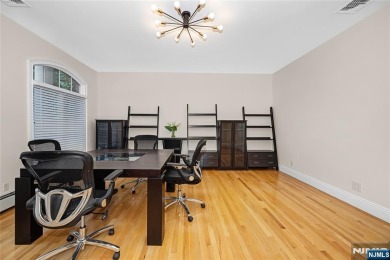 Set on a beautifully landscaped acre with a stunning circular on Old Tappan Golf Course in New Jersey - for sale on GolfHomes.com, golf home, golf lot